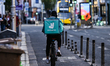DUBLIN, IRELAND - MAY 22: Deliveroo courier seen in Dublin center, on May 22, 2024, in Du...
