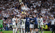 Toni Kroos of Real Madrid is being celebrated by his teammates at the end of the La Liga E...