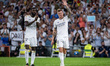 Toni Kroos of Real Madrid is cheering the fans while his teammates are celebrating him at...