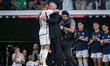 Toni Kroos of Real Madrid is hugging Carlo Ancelotti, coach of Real Madrid, at the end of...