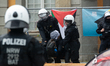 Police are arresting the students who are refusing to leave the entrance access to Bonn Un...