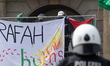 A dozen students from Bonn University of Pro-Palestinian groups are blocking the entrance...