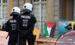 A dozen students from Bonn University of Pro-Palestinian groups are blocking the entrance...