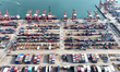 Cargo ships are stopping at their berths to load and unload containers at the container te...