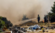 Firemen are operating in the area in Limassol, Cyprus, on May 31, 2024. Some buildings are...