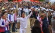 CAEN, FRANCE - MAY 30:   Etienne Carpentier proudly carries the Olympic flame as it reach...
