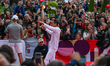 CAEN, FRANCE - MAY 30:   Etienne Carpentier proudly carries the Olympic flame as it reach...