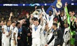 Toni Kroos of Real Madrid is celebrating with the trophy after the UEFA Champions League F...
