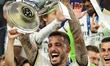Joselu Mato of Real Madrid is celebrating with the trophy after the UEFA Champions League...