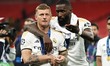 Toni Kroos of Real Madrid and Antonio Rudiger of Real Madrid are celebrating after the UEF...