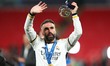 Daniel Carvajal of Real Madrid is celebrating with the man of the match trophy after the U...