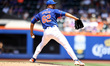 Jose Quintana #62 is throwing during the third inning of the baseball game against the Ari...