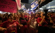 People, Holding Banners And Flags, Gather To Demonstrate Demanding That Israel Stop Its At...