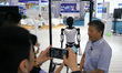 Visitors are visiting artificial intelligence robot products displayed at the robot exhibi...