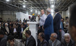 Yadollah Eslami (C), a former reformist member of parliament, is delivering speeches while...