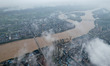 Floodwaters are passing through the Rongan county section of the Rongjiang River in the up...