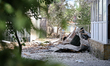 Debris is covering the ground outside an administrative building of the State Research Con...