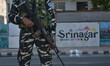 An Indian paramilitary trooper is standing alert ahead of Prime Minister Narendra Modi's v...
