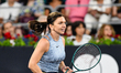 Simona Halep is in action during a tennis demo event for a sports festival in Cluj-Napoca,...