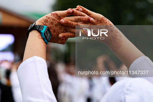 A girl is taking part in the 10th International Yoga Day Celebrations in Baramulla, Jammu and Kashmir, India, on June 21, 2024. Indian Prime... by Nasir Kachroo/NurPhoto