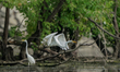 A great egret is looking for fish just after sunrise at the Oxbow Nature Conservancy in La...