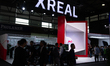 Xreal is setting up their booth at SNIEC in Shanghai, China, on June 26, 2024, during the...