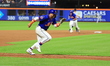 Francisco Alvarez #4 of the New York Mets is scoring on a sacrifice fly during the fifth i...