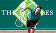 Alexander Bublik is serving to Alexander Shevchenko during the Boodles Tennis Tournament a...