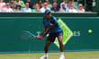 Anirudh Chandrasekar is playing a backhand against Marcus Willis and Jay Clarke during the...