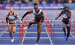 Cindy Sember is winning the 100m hurdles during the Microplus UK Athletics Championships a...