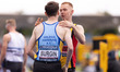 Ben Pattison is talking to Max Burgin after the 800m final during the Microplus UK Athleti...