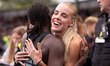Keely Hodgkinson is watching the 800m final and hugging Dina Asher-Smith during the Microp...