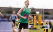 Charlie Dobson is winning the 400m final and getting the Olympic qualifying time during th...