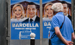 PARIS, FRANCE - JUNE 30:   A man walks by vandalized French parliamentary elections poste...