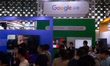 Visitors are visiting the Google stand at the World Artificial Intelligence Conference at...