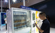 A visitor is visiting the digital payment stand from the Bank of China at the World Artifi...