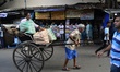 A rickshaw puller is being seen on the street of Kolkata, India, on July 8, 2024. 