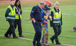Fredrik Lindgren of Sweden is walking back to the pits with the medical staff during the M...