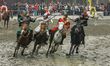 Actors are performing a cavalry battle from the Three Kingdoms era at the CCTV filming loc...