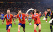 Marc Cucurella (Spain) is celebrating with Dani Olmo (Spain) and Fermin Lopez (Spain) afte...