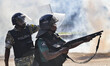 Bangladesh police personnel are firing tear shells as students are protesting against quot...