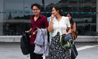 Nepali students are exiting the terminal of Tribhuvan International Airport upon arriving...