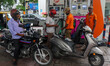 A crowd is gathering at a petrol filling station in Kolkata, India, on July 22, 2024. Peop...