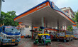 A crowd is gathering at a petrol filling station in Kolkata, India, on July 22, 2024. Peop...