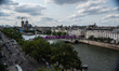 I am viewing the center of Paris, the Seine, and the Olympic competition areas from the te...