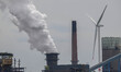 A wind turbine is operating beyond the iron ore site. Steelanol, the new technology of the...