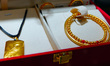 Gold jewelry is being displayed at a gold jewelry store in Yichang, Hubei province, China,...