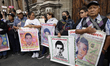 Mothers, fathers, and relatives of the 43 missing students from Ayotzinapa are waiting out...