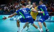 (51) MACKOVSEK Borut and (3) BLAGOTINSEK Blaz of Team Slovenia are battling for possession...