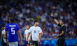 Referee MARTINEZ Said is giving a yellow card to Kiliann SILDILLIA of the France team duri...
